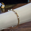 GOLDEN Faux Pearl & Red Rhinestone Tennis Bracelet - PopRock Vintage. The cool quotes t-shirt store.