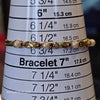 GOLDEN Faux Pearl & Red Rhinestone Tennis Bracelet - PopRock Vintage. The cool quotes t-shirt store.